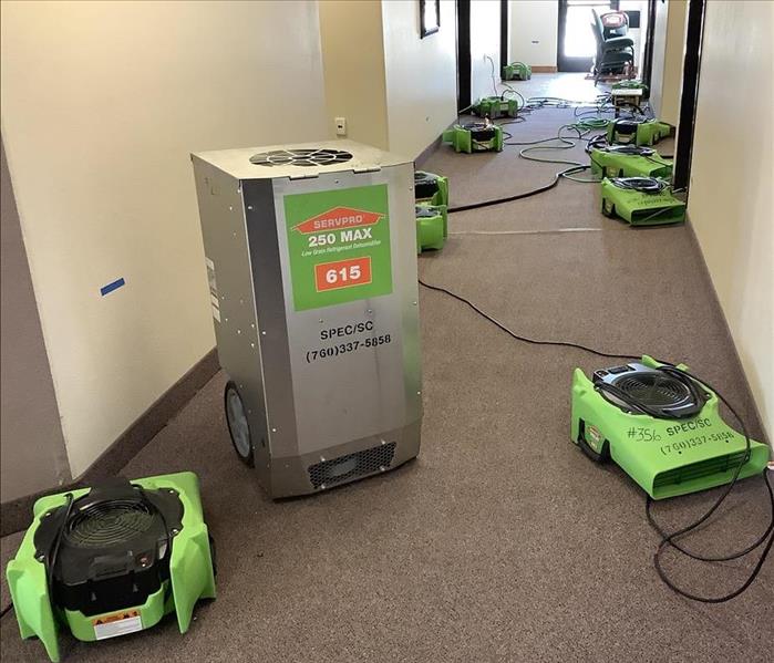 Hallway with SERVPRO drying equipment